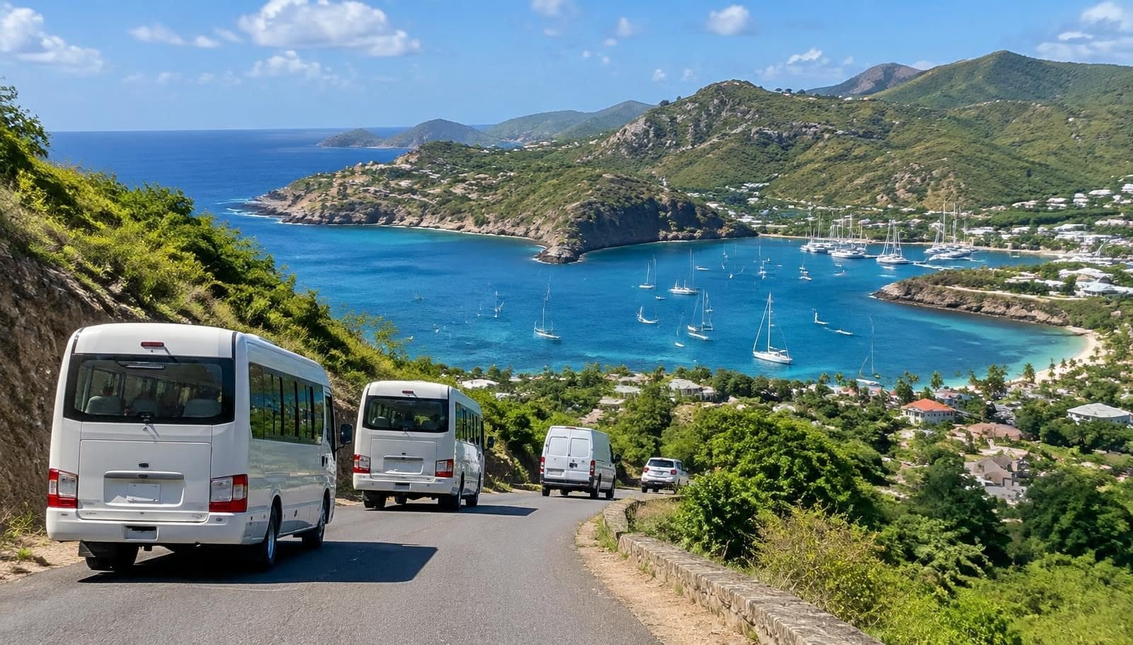 Tour minibuses and a delivery van on the hill road above English Harbour, Antigua